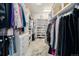 Walk-in closet with custom shelving, drawers, and ample storage for clothing, shoes, and accessories at 8337 Greenwood Dr, Niwot, CO 80503