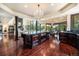 Open-concept kitchen with an island, stainless steel appliances, and views, perfect for cooking and entertaining guests at 8337 Greenwood Dr, Niwot, CO 80503