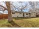 House exterior with a large tree and fenced yard at 3460 W 131St Ave, Broomfield, CO 80020