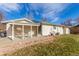 Back of house with covered patio and grassy backyard at 3460 W 131St Ave, Broomfield, CO 80020