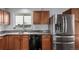 Modern kitchen with stainless steel appliances and granite countertops at 3460 W 131St Ave, Broomfield, CO 80020