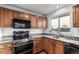 Modern kitchen featuring granite countertops and stainless steel appliances at 3460 W 131St Ave, Broomfield, CO 80020