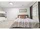 Bright bedroom featuring bunk beds, neutral colors, and a cozy atmosphere at 8107 Arapahoe Peak St, Littleton, CO 80125