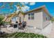 Back patio featuring an outdoor seating area, lush landscaping, and comfortable ambiance at 5741 Echo Park Cir, Castle Rock, CO 80104