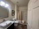 Well-lit bathroom with modern vanity, toilet, and shower-tub combination, offering comfort and style at 5741 Echo Park Cir, Castle Rock, CO 80104