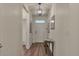 Inviting foyer features hardwood floors, neutral walls, and stylish lighting fixtures at 5741 Echo Park Cir, Castle Rock, CO 80104