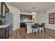 Spacious kitchen with granite countertops, stainless steel appliances, and breakfast bar seating at 5741 Echo Park Cir, Castle Rock, CO 80104