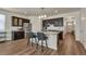 Open kitchen features an island with seating and stainless steel appliances at 5741 Echo Park Cir, Castle Rock, CO 80104