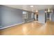 Bright living room with hardwood floors and a window view of the building exterior at 1977 S Josephine St # 304, Denver, CO 80210