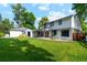 Backyard featuring a barbecue and lush green grass at 1998 S Harlan Ct, Lakewood, CO 80227