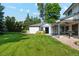 Spacious backyard with lush lawn, offering ample space for recreation at 1998 S Harlan Ct, Lakewood, CO 80227