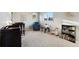 Bright bedroom with soft carpet, natural light, rocking horse and bookshelves at 1998 S Harlan Ct, Lakewood, CO 80227