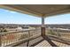 Covered balcony with railing features scenic neighborhood views at 20132 Spruce Point Pl, Parker, CO 80134