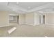 Expansive bonus room featuring neutral carpet, recessed lighting, and open floor plan at 20132 Spruce Point Pl, Parker, CO 80134