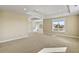 Spacious bonus room featuring neutral carpet, recessed lighting, and bright windows at 20132 Spruce Point Pl, Parker, CO 80134