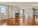 Spacious living room featuring a fireplace, large windows and ample natural light at 20132 Spruce Point Pl, Parker, CO 80134