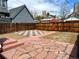 Backyard with grass and checkerboard patio at 52 S Washington St, Denver, CO 80209
