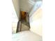 Basement stairs leading to an unfinished basement at 52 S Washington St, Denver, CO 80209