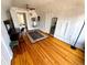 Bright bedroom with wood floors, ceiling fan, bubble chair and a decorative rug at 52 S Washington St, Denver, CO 80209
