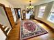 Elegant dining room with a decorative rug and chandelier lighting at 52 S Washington St, Denver, CO 80209