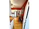 Traditional kitchen featuring white cabinets, stainless steel appliances, and a breakfast bar with seating at 52 S Washington St, Denver, CO 80209