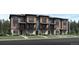 New townhome with a landscaped yard, private balconies, and modern architecture in a desirable community at 835 Josephine Way, Superior, CO 80027