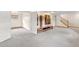 Finished basement with an open layout, storage cabinets and staircase at 1185 Fawnwood Rd, Monument, CO 80132