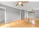 Bright primary bedroom offers lots of space, natural light, and hardwood floors at 1185 Fawnwood Rd, Monument, CO 80132