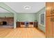 Inviting living room features a brick fireplace and a built-in wine bar at 1185 Fawnwood Rd, Monument, CO 80132