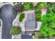 This is an aerial view of the home with a lovely landscaped yard and patio area at 15918 E Flora Pl, Aurora, CO 80013