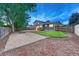 Extensive backyard with a sandbox and patio, perfect for outdoor activities and relaxation at 15918 E Flora Pl, Aurora, CO 80013