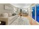 Comfortable living room with sliding glass door access to the backyard at 15918 E Flora Pl, Aurora, CO 80013
