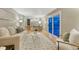 Open living room with sliding door access to the backyard and patio at 15918 E Flora Pl, Aurora, CO 80013