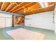 Partially finished basement with concrete floor and white painted walls at 2180 S Flower Way, Lakewood, CO 80227