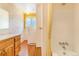 Bathroom featuring vanity, bath and shower at 2180 S Flower Way, Lakewood, CO 80227