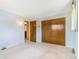 Bedroom features an ensuite bathroom and closet at 2180 S Flower Way, Lakewood, CO 80227