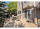 Outdoor patio with a dining table, chairs, barbecue and a fire pit at 1624 Westin Dr, Erie, CO 80516