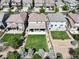 Aerial view of a home showcasing a spacious backyard, patio, and well-manicured lawn at 2198 Broadleaf Loop, Castle Rock, CO 80109