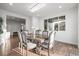 Beautiful dining room with large windows, allowing natural light to illuminate the space at 2198 Broadleaf Loop, Castle Rock, CO 80109