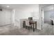 Bright hallway area leading to carpeted rooms at 2198 Broadleaf Loop, Castle Rock, CO 80109
