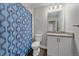 Clean bathroom with shower/tub combo and vanity at 12255 Hazel Spruce Ct, Parker, CO 80134