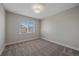 Simple bedroom with neutral paint, carpet, and window coverings at 12255 Hazel Spruce Ct, Parker, CO 80134