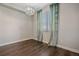 Spacious dining room featuring hardwood floors and light walls at 12255 Hazel Spruce Ct, Parker, CO 80134
