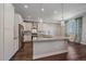 Modern kitchen with granite countertops and stainless steel appliances at 12255 Hazel Spruce Ct, Parker, CO 80134