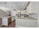 Modern kitchen with granite countertops and stainless steel appliances at 12255 Hazel Spruce Ct, Parker, CO 80134
