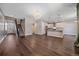 Open concept living room and kitchen with hardwood floors at 12255 Hazel Spruce Ct, Parker, CO 80134