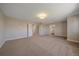 Spacious main bedroom with neutral walls and plush carpeting at 12255 Hazel Spruce Ct, Parker, CO 80134