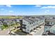 A neighborhood featuring modern townhomes with a view of open land in the distance at 16637 Shoshone St, Broomfield, CO 80023