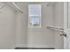 Bright closet with window and shelves for ample storage and organization at 3372 Central Park Blvd, Denver, CO 80238