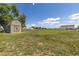 Large backyard with an accessory shed, volleyball court and a lot of open space at 2370 W 152Nd Ave, Broomfield, CO 80023